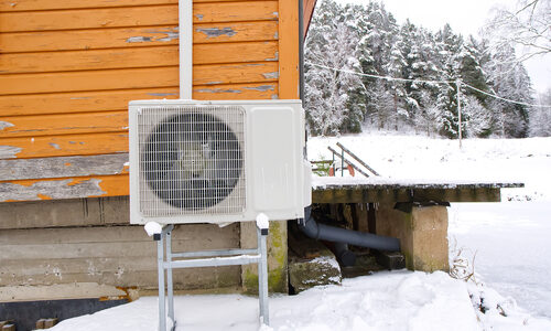 Air,To,Water,Heat,Pump,Near,An,Old,Wooden,House Air,To,Water,Heat,Pump,Near,An,Old,Wooden,House